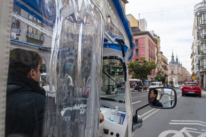 Eco Friendly Tuk Tuk Experience with the Local in Madrid - Cibeles Fountain, Puerta de Alcalá, and Plaza Santa Ana