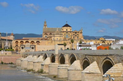 From Madrid: Cordoba and Mosque Day Trip by High-Speed Train - First impressions on the old-town walk: Roman Bridge to Courtyards