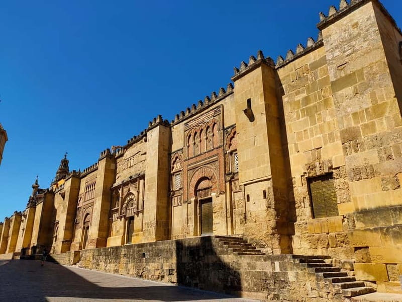 From Madrid: Cordoba and Mosque Day Trip by High-Speed Train - Entering the Mezquita-Catedral: UNESCO, light, and what the guide adds