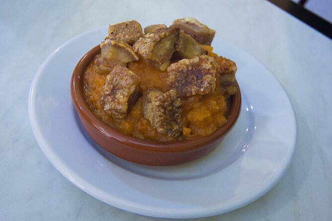 Gastronomic Tour: Discover the best “Wines and Tapas of Madrid” - Mercado Jamón Ibérico: Acorn-Fed Ham, Personality of Cheeses, Quality of Oils