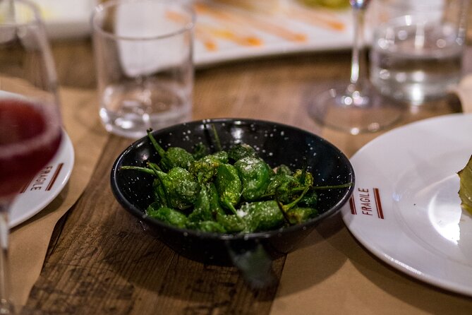Half-Day Small Group VIP Culinary Tour in Madrid - What you actually taste: paella, peppers, cheese, and a sweet course
