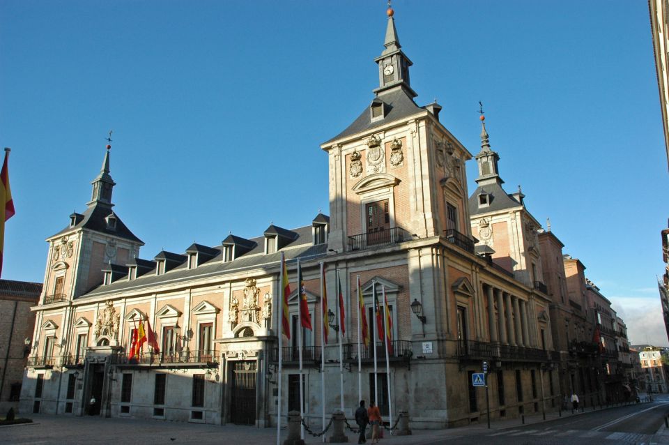 Madrid: 1.5-Hour City Highlights Guided Walking Tour - Puerta del Sol and Plaza Mayor: the best place to feel Madrid’s rhythm