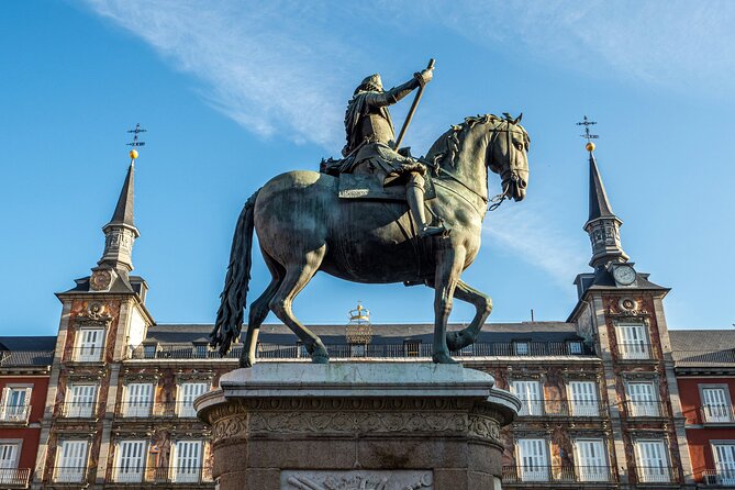 Madrid Bike Tour with Churros and Wine, Ham, and Cheese Upgrade - Plaza de Cibeles to Puerta de Alcalá: Landmarks With Stories