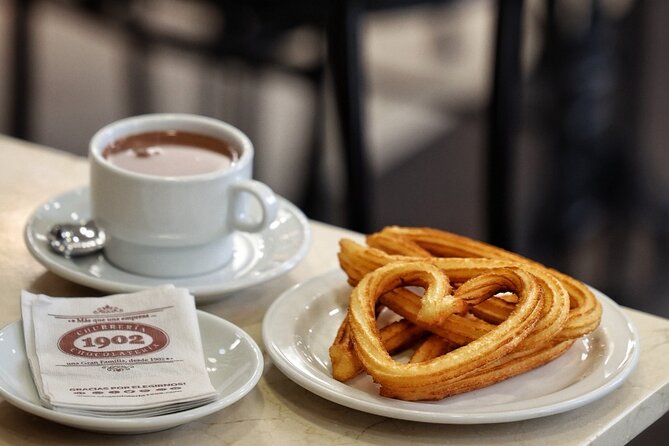 Madrid Bike Tour with Churros and Wine, Ham, and Cheese Upgrade - San Jerónimo el Real and the Prado Area: Art Views Without the Museum Pressure