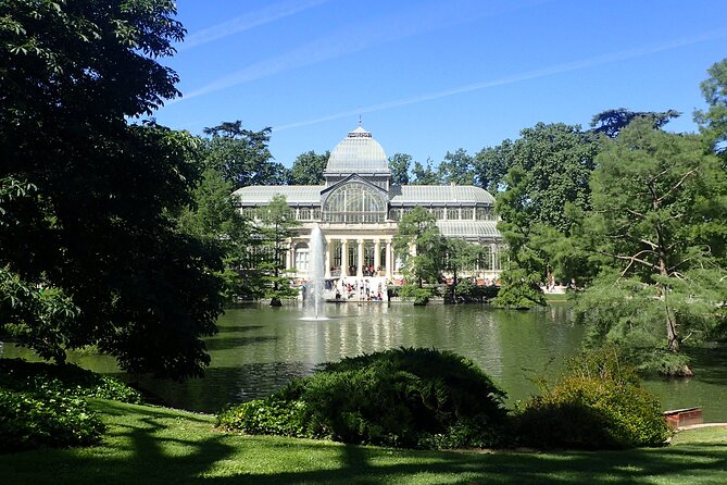 Madrid City Tour | Regular Bike or E-Bike | Reduced Groups - Retiro Park by bike: French parterre, lake pause, and Crystal Palace