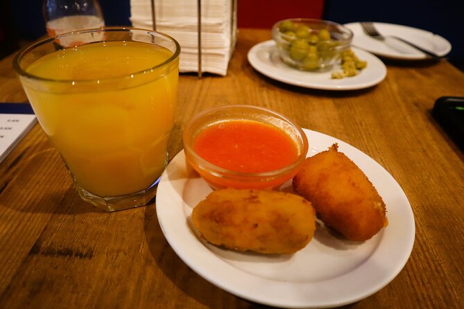 Madrid Food Tasting Tour of Hidden Gems (Small Groups) - Stop 1 at Plaza de la Provincia: Bocadillos de Calamares + beer