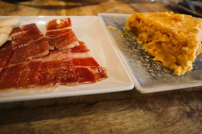 Madrid Food Tasting Tour of Hidden Gems (Small Groups) - Stop 3 on Cava Baja: Jamón Ibérico + Tortilla Madrileña in a special setting