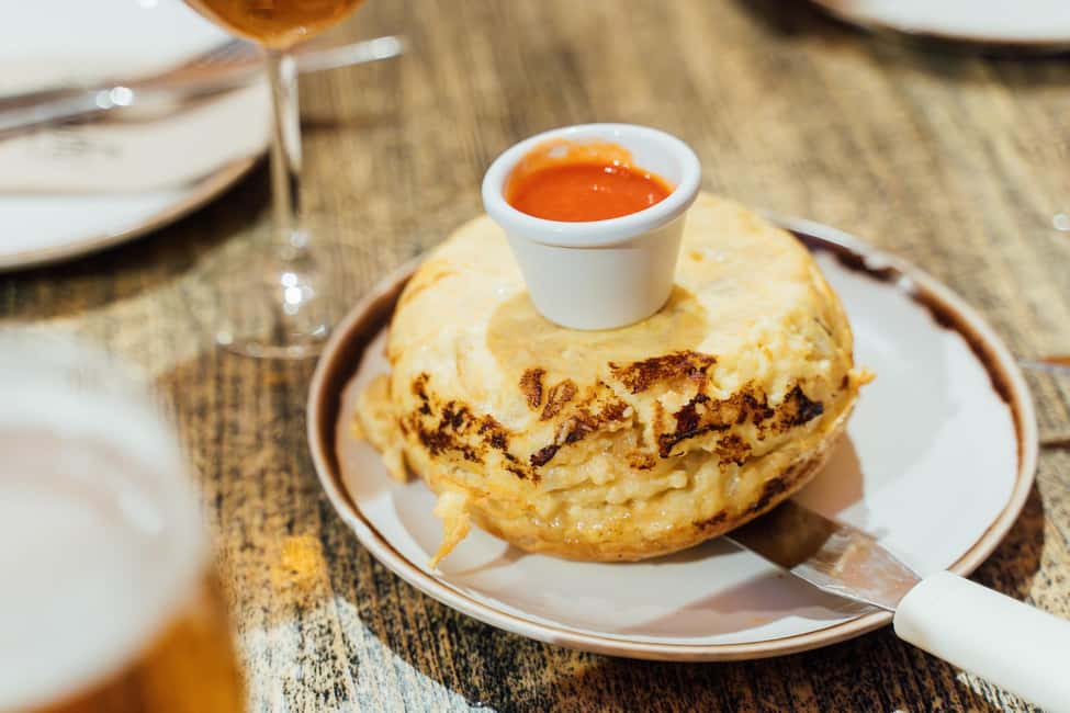 Madrid: Food Walking Tour with Drink and Local Guide - Vegetarian-friendly, but not gluten-free or vegan