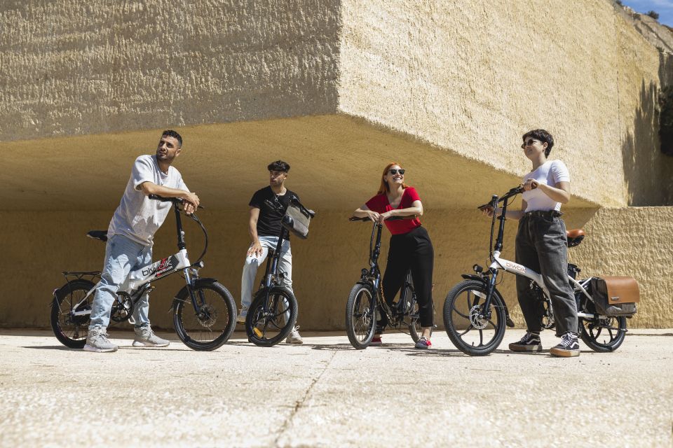 Madrid: Guided Electric Bike Tour. City center & Retiro Park - Retiro Park: Pond Views, Statues, and the Crystal Palace Area