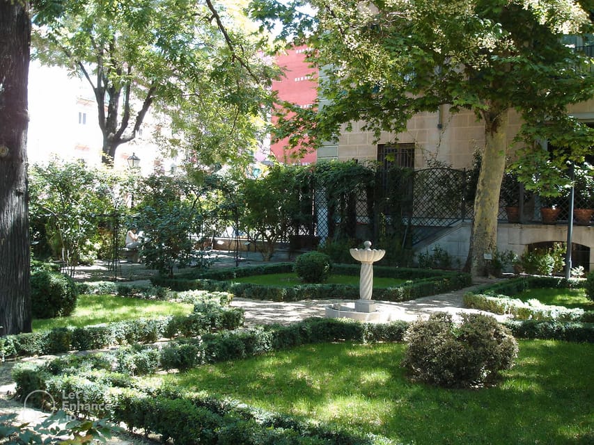 Madrid: Hidden Gems and Secrets Small Group Walking Tour - Following Madrid’s layers: from Muslim walls to royal power