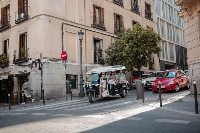 Madrid Historical Tour with Local Guide in Eco Tuk Tuk Private - Atocha Station: The Busiest Hub Makes the City Feel Real