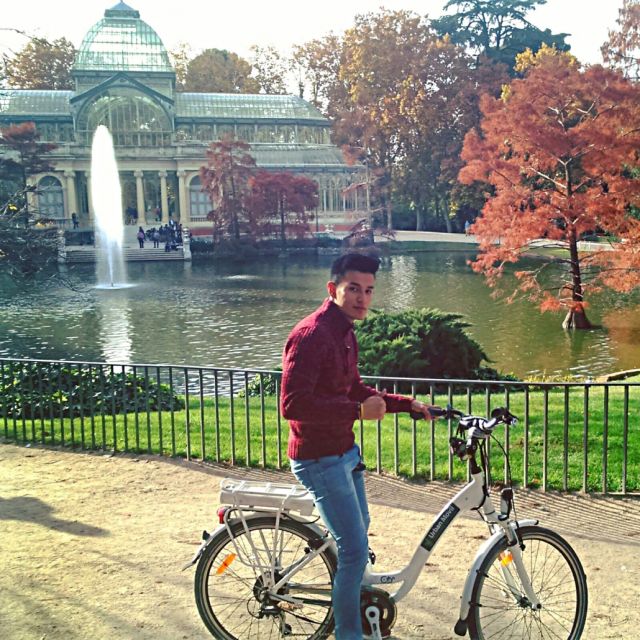 Madrid: Literary Quarter & Retiro Park Electric Bike Tour - Departing toward downtown: Alcala Gate, Cibeles, and Puerta del Sol