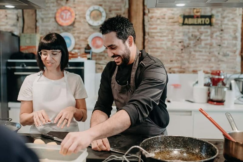 Madrid: Paella & Tapas Cooking Class and Market Visit - Vermouth aperitif, Basque-style tapa, and crema catalana