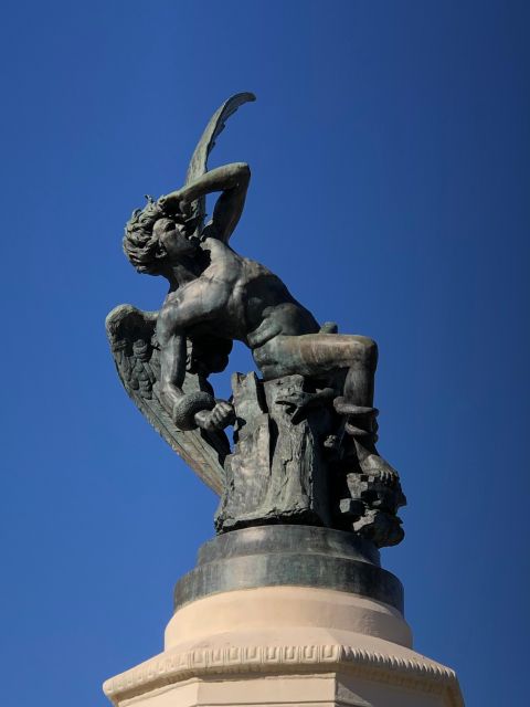 Madrid: Prado Avenue and Retiro Park Guided Walking Tour - Plaza de Cibeles and the art core: quick stops that set the tone