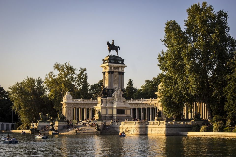 Madrid: Retiro Park Guided Tour and Tapas Tasting - Retiro’s trees, sculptures, lake, and the Alfonso XII pond stop