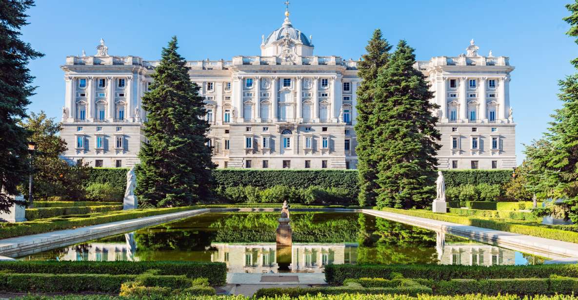 Madrid: Royal Palace Guided Tour with Entry Ticket - Meeting point and starting smart at Punto de Información Turística