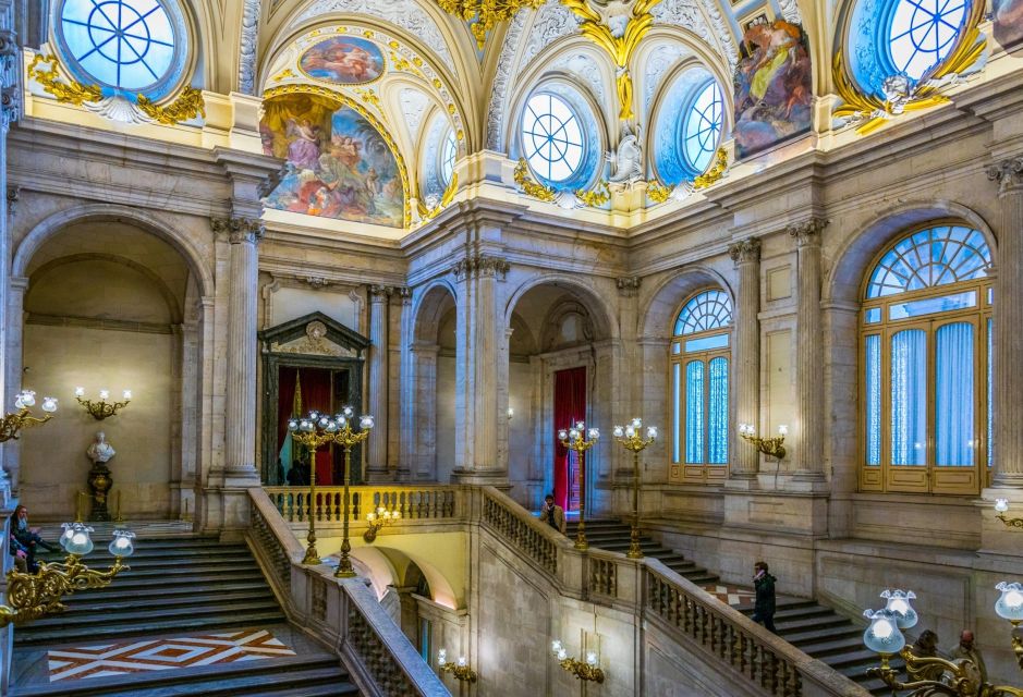 Madrid: Royal Palace Guided Tour with Entry Ticket - Carlos IV and Ferdinand VII rooms: French furniture, chandeliers, and the 1879 renovation
