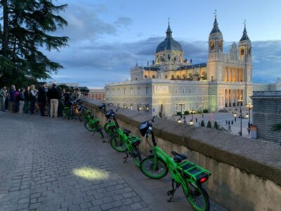 Madrid: Sunset and Night Lights Bike Tour - Almudena façade and Palacio Real: seeing power in evening light