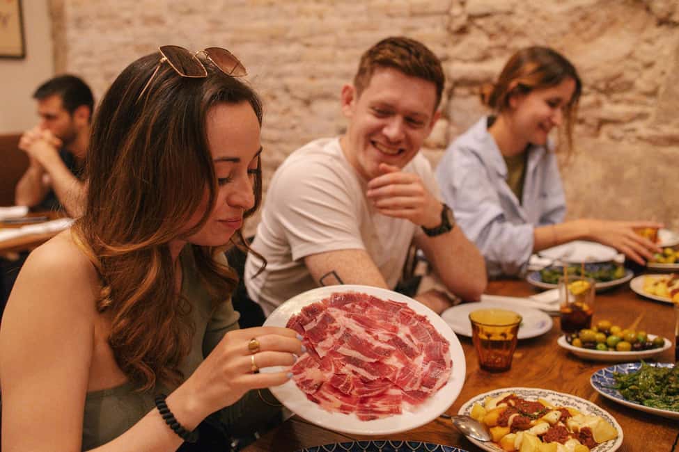 Madrid: Tapas Dinner Party Food Tour with Guide - Key highlights you’ll feel right away