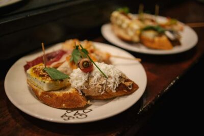 Madrid: Tapas Dinner Party Food Tour with Guide - The tasting menu: tortilla, stuffed mushrooms, and cheese (and why that matters)