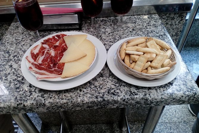 Madrid Tapas & Drinks: A Small Group Culinary Adventure - Tablao Arco de Cuchilleros Area: Medieval Madrid Meets Lunchy Tapas