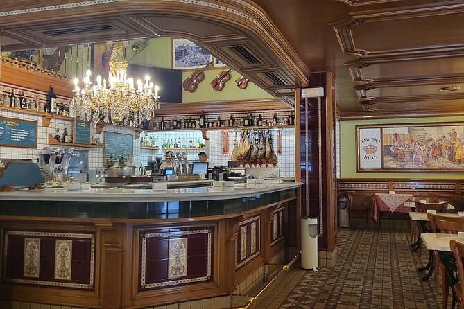 Madrid Tapas, Traditions & History Tour - Royal Palace Area Pause: King Felipe IV Statue and a Food-Story Bridge