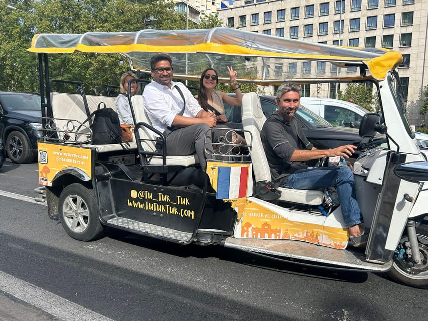 Madrid: Traditional Tour wh Private guide in yellow Tuk Tuk - Plaza Isabel II to Opera area: setting the tone around Royal Theater and Opera Square