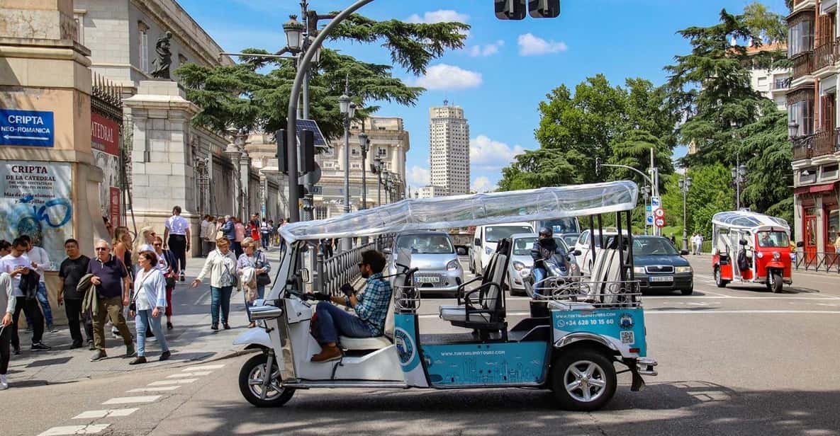 Madrid Tuk Tuk Welcoming Tour - Market of San Miguel and Puerta del Sol: where food and movement meet