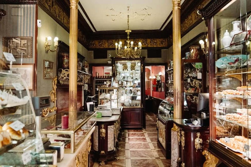 Madrid: Ultimate Food Tour of Local Markets & Tapas - Casa González: Cheese and Wine in a Deli With a 1930s Secret