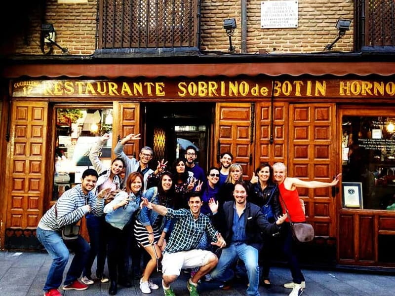 Mysteries & Tapas Tour in Madrid + Pub Crawl - Finding the group at Puerta del Sol (bear logo and red shirt)