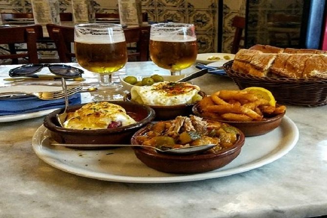 Private Tapas Tour (Only your group will participate) - Puerta del Sol and Plaza Mayor: the history you’ll actually remember