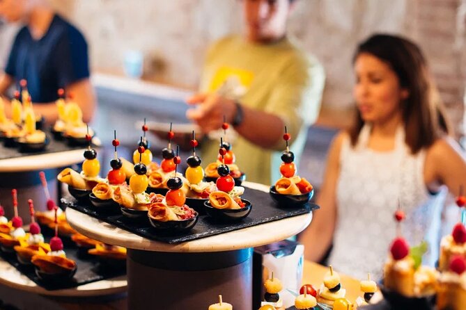 Tasty Tapas & Drinks Tour with a Rooftop Included - The Meeting Point: Taberna Tirso de Molina to Barrio de las Letras
