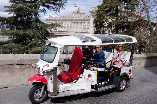 Tour Madrid in 2 hours! Electric Tuk - Fast, Fun, and Exclusive - Plaza Colón, Gran Vía, National Library, and the Bank Buildings: City Infrastructure as Sight