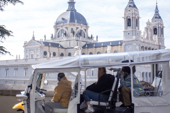 Tour of Historic and Modern Madrid with a guide in a yellow tuk tuk - Football culture in motion: Real Madrid, Atlético, and the Museum stop